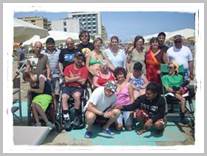 Foto di gruppo in spiaggia a Villa Marina